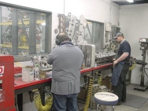 This picture shows our cylinder head porting room. We have 3 cylinder head porters full time. 