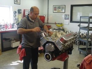Roberto Bergeron is one of our engine assemblers and is shown here doing a final assembly on one of our 565 engines. Roberto has worked for us assembling engines for over 10 years. 