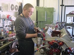 This photo shows our tear-down department. Lonnie (Junior) Donathan takes every engine apart that comes to our shop. He inspects all components and evaluates what needs to be done. Junior has worked with Steve since High school and have been a valued employee for over 23 years. Junior may have the most important job at Steve Schmidt Competition Engines as he has to identify a lot of problems and convey them to our machinist and engine builders.